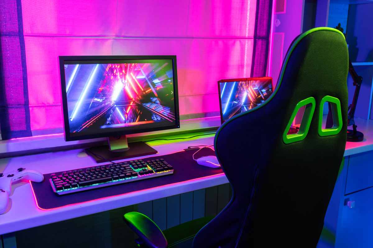 gaming setup featuring a desktop monitor and laptop