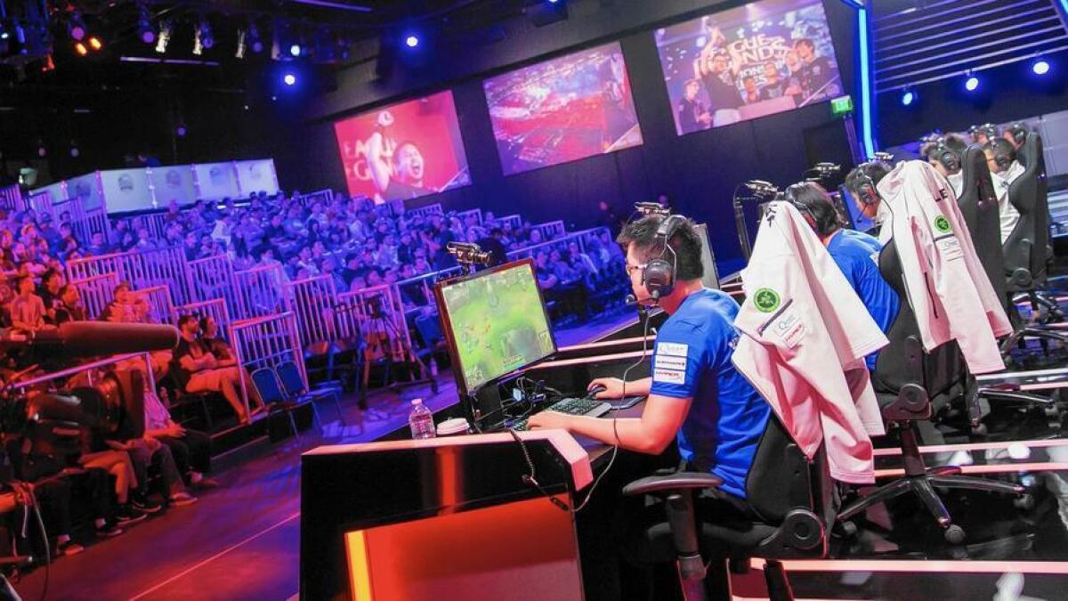 competitive gaming event scene, showcasing players at computers