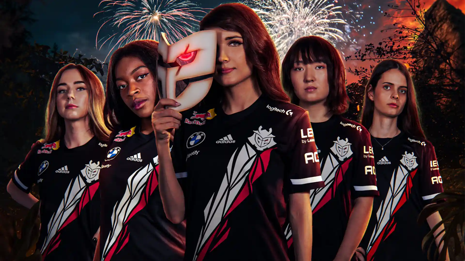 group of four esports players in official team jerseys